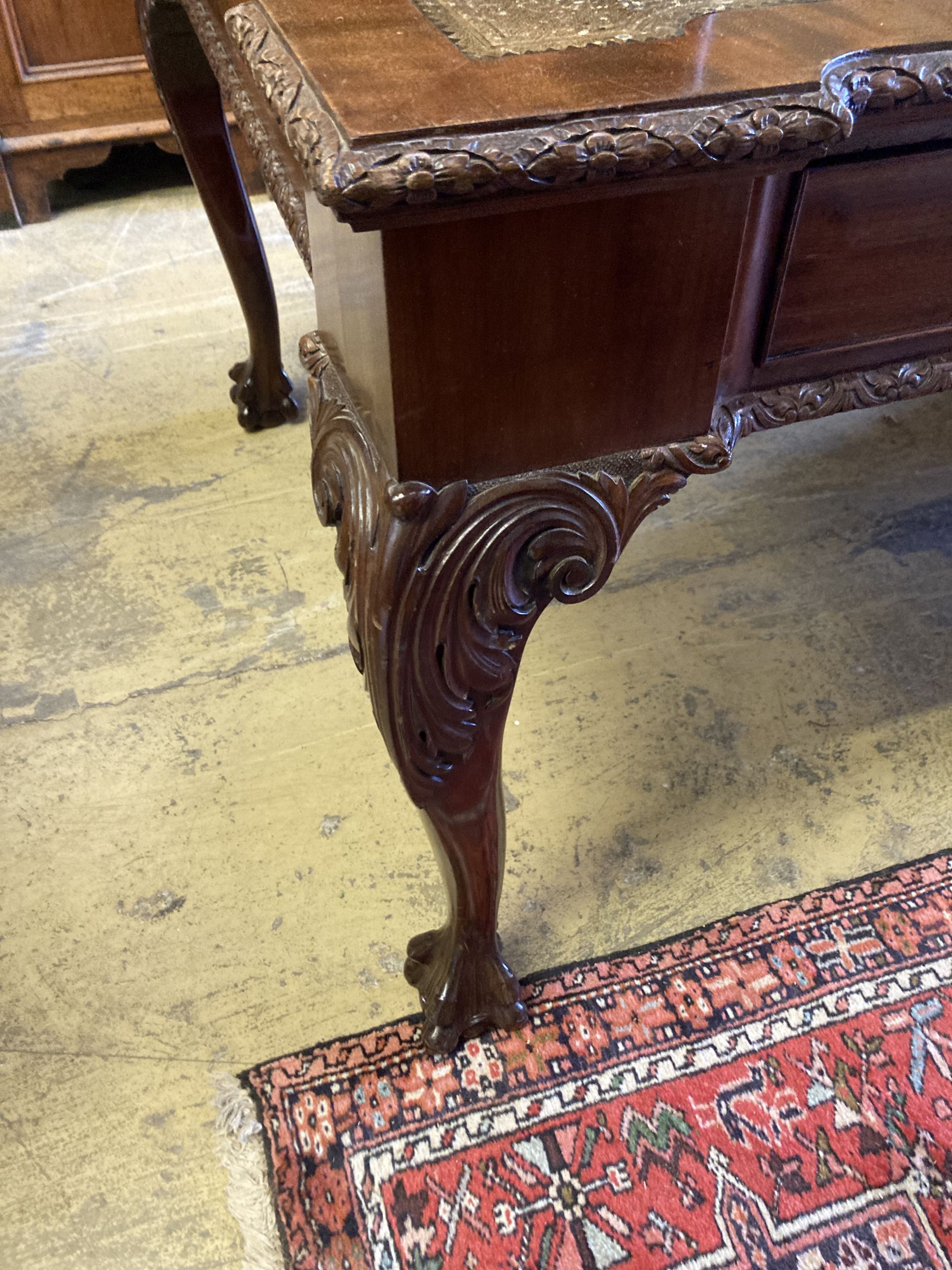 A George III style mahogany leather topped writing table, width 182cm, depth 104cm, height 76cm